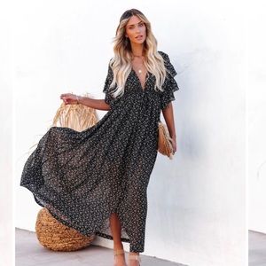 Maxi dress never been worn tags still on.  Bought on VICI brand Flawless